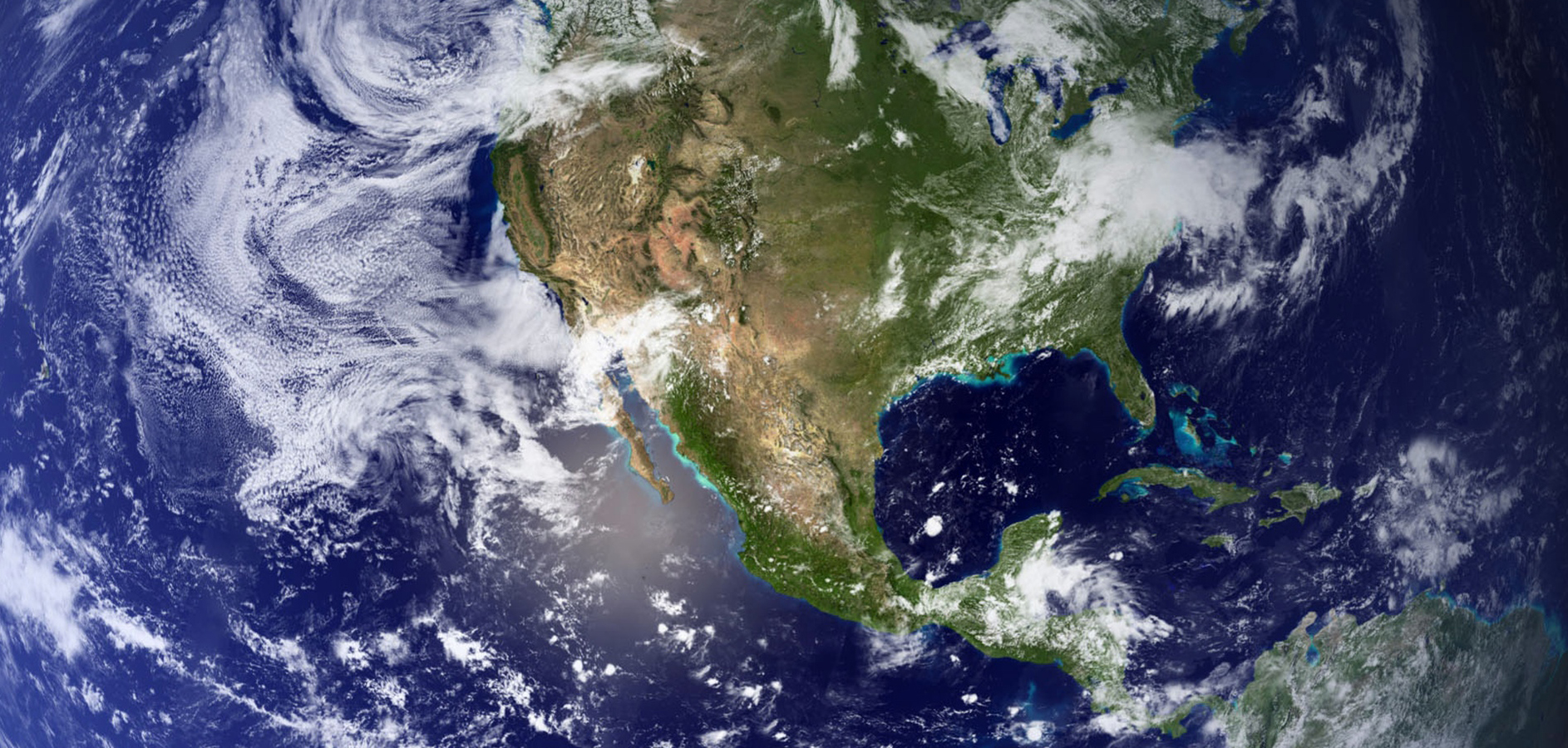 A true color satellite image of North America with some cloud cover.